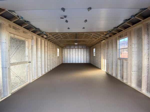 Inside of large garage shed with insulation