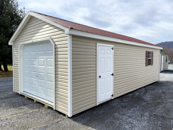 Tan Garage Shed with Red Roof
