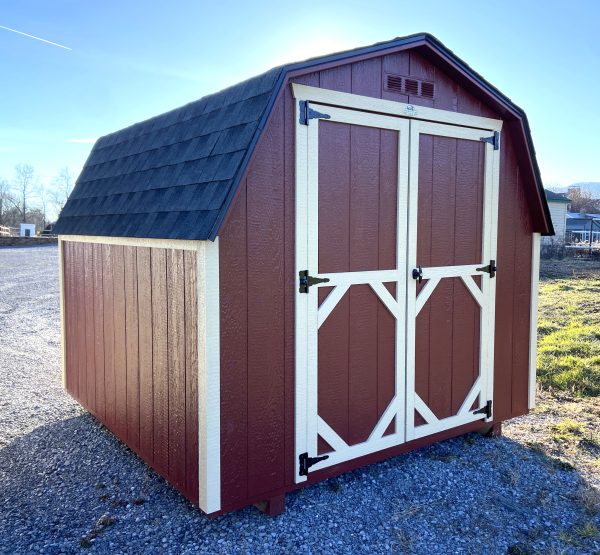 Dark Red Shed with White Trimming