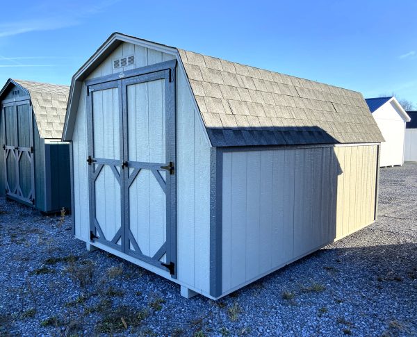 cream colored shed with grey trimming