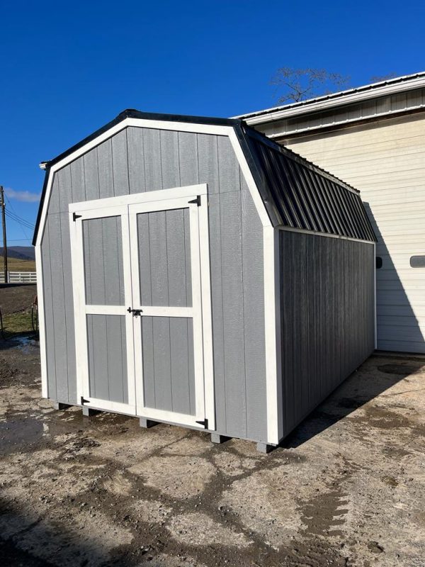 Small Grey Shed with White Trimming