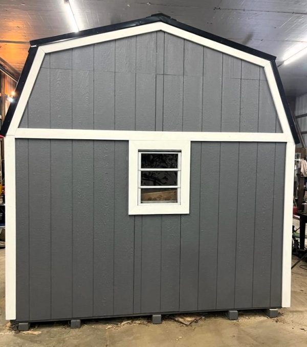 grey shed with white trimming