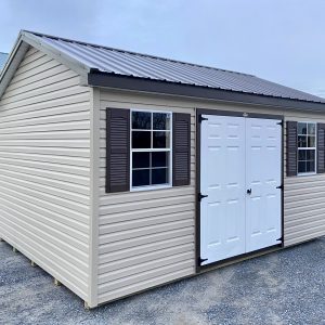 tan shed with brown trimming