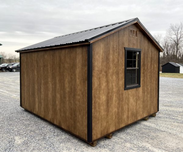 Brown distressed shed with black trimming