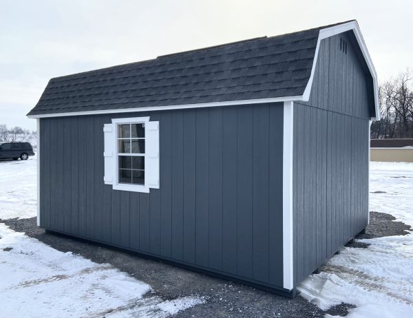 dark grey shed with white trimming