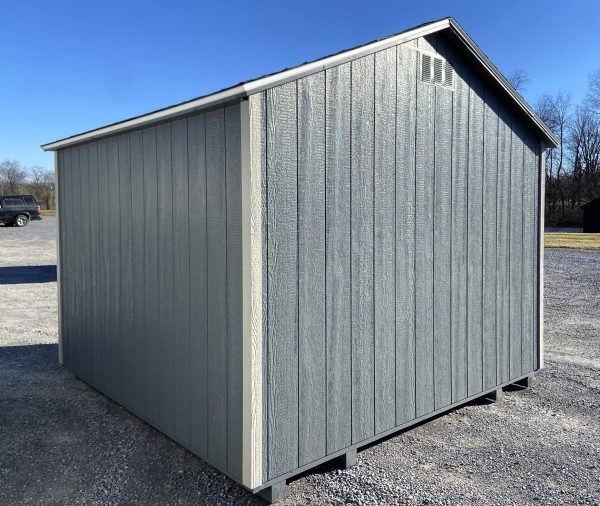 grey shed with white trim