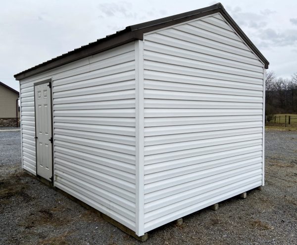 Small White Shed with Black Roof